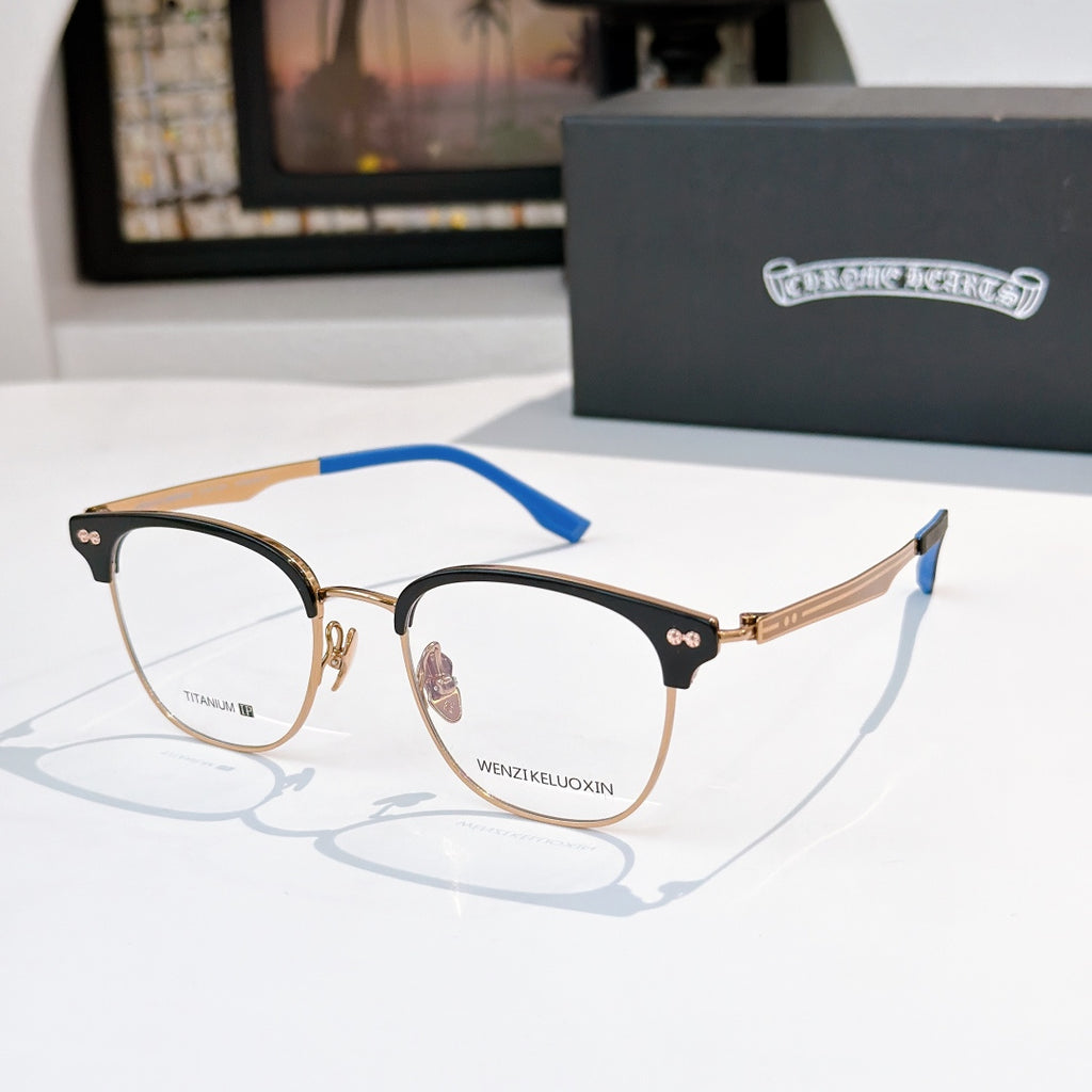 Tortoiseshell metal eyeglass frames with clear lenses and blue temple tips