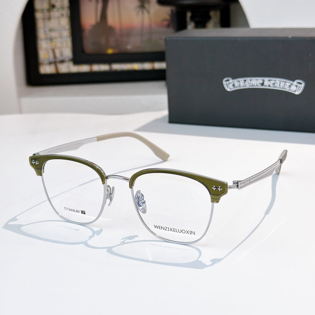 Gold-tone eyeglass frames with clear lenses and tan temple tips