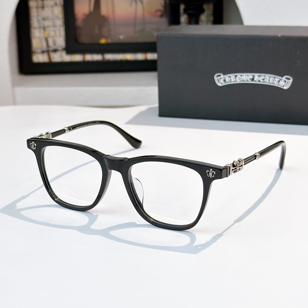 Black full-rim eyeglasses with clear lenses and silver-tone temple details