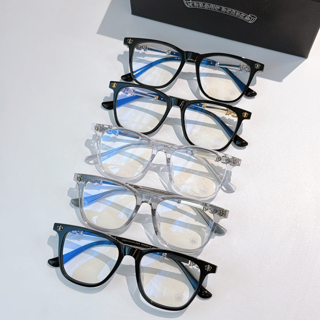 Assorted eyeglasses with clear lenses, black and transparent frames stacked
