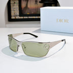 Green-tinted sunglasses with silver frame and dark temples.