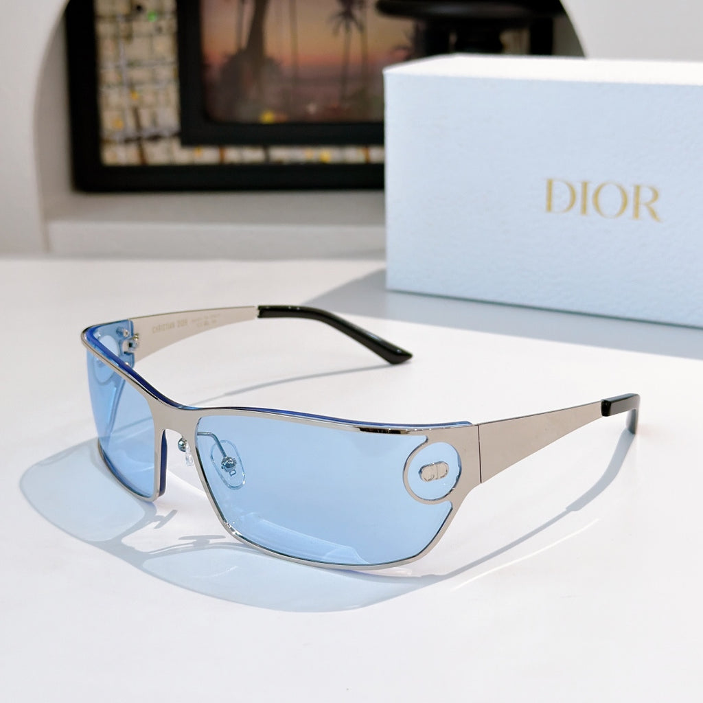 Blue-tinted sunglasses with dark arms and gold logo details.