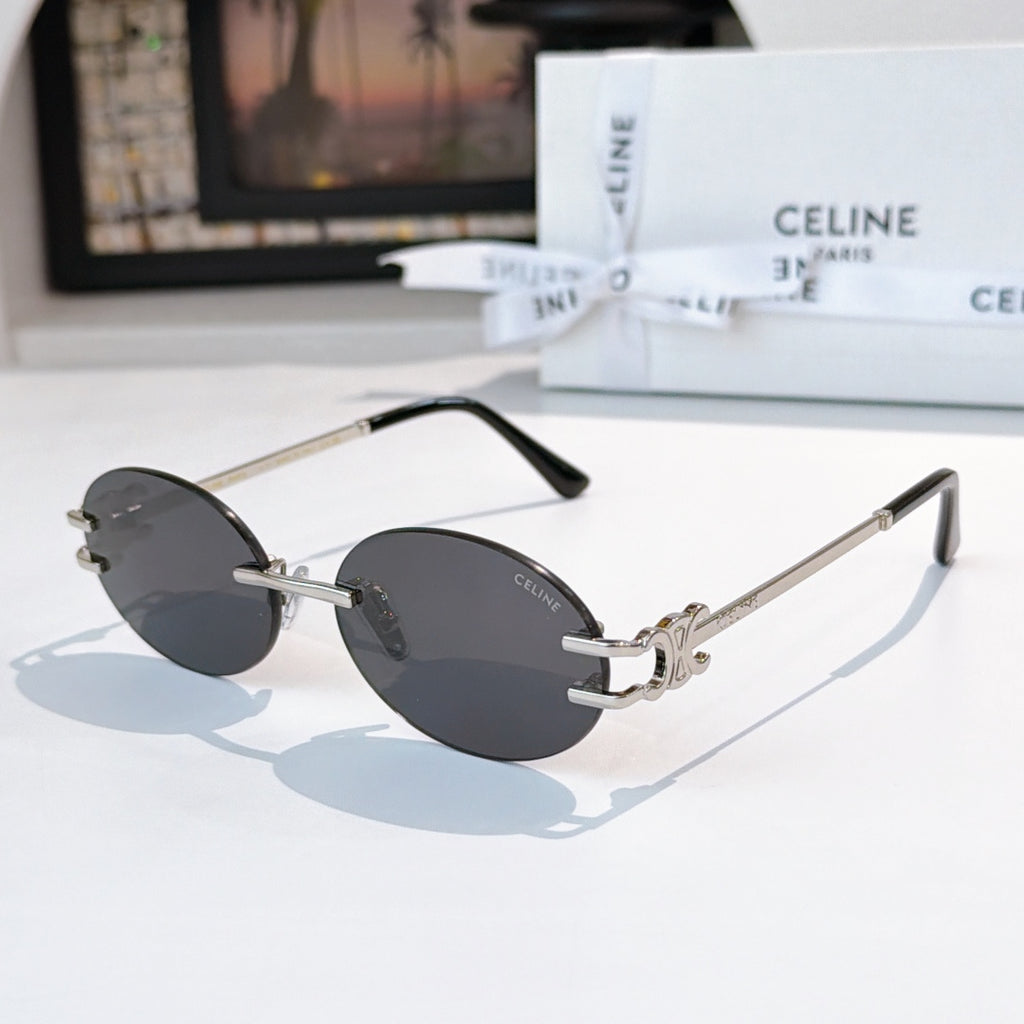 Celine round sunglasses with dark lenses and silver metal frames