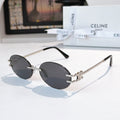 Celine round sunglasses with dark lenses and silver metal frames