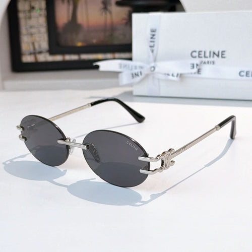 Celine round sunglasses with dark lenses and silver metal frames