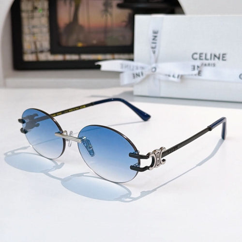 Celine round sunglasses with blue-tinted lenses and metal frames