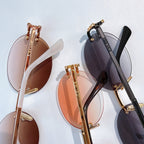 Celine sunglasses close-up: gold frames with tinted round lenses