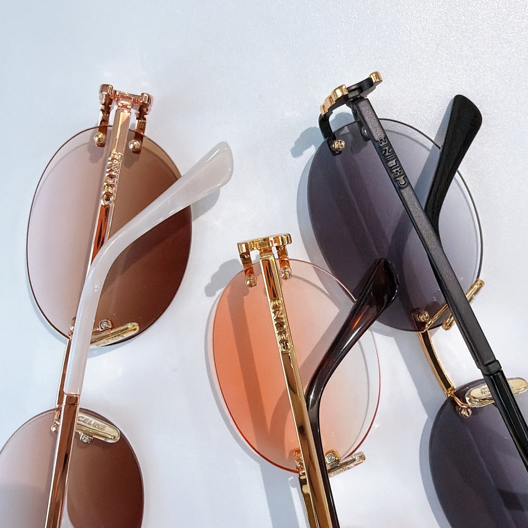 Celine sunglasses close-up: gold frames with tinted round lenses
