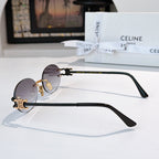 Celine round sunglasses with dark lenses and dark arms with gold details
