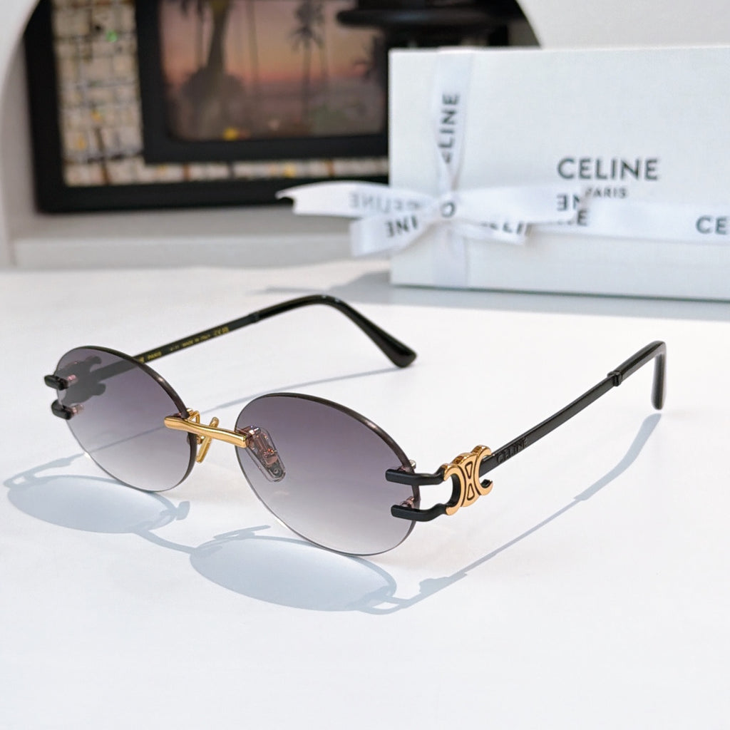 Celine round sunglasses with dark lenses and gold-tone accents