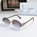 Celine round sunglasses with dark lenses and gold-tone accents