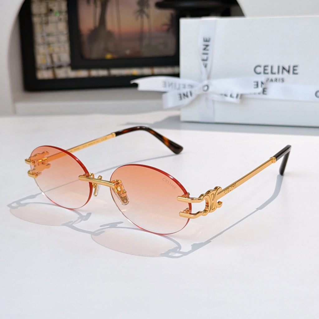 Celine round sunglasses with amber lenses and gold-tone metal frames