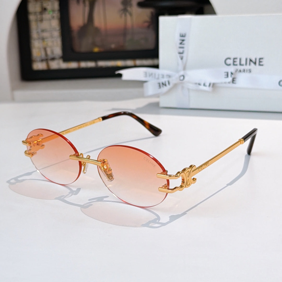 Celine round sunglasses with amber lenses and gold-tone metal frames