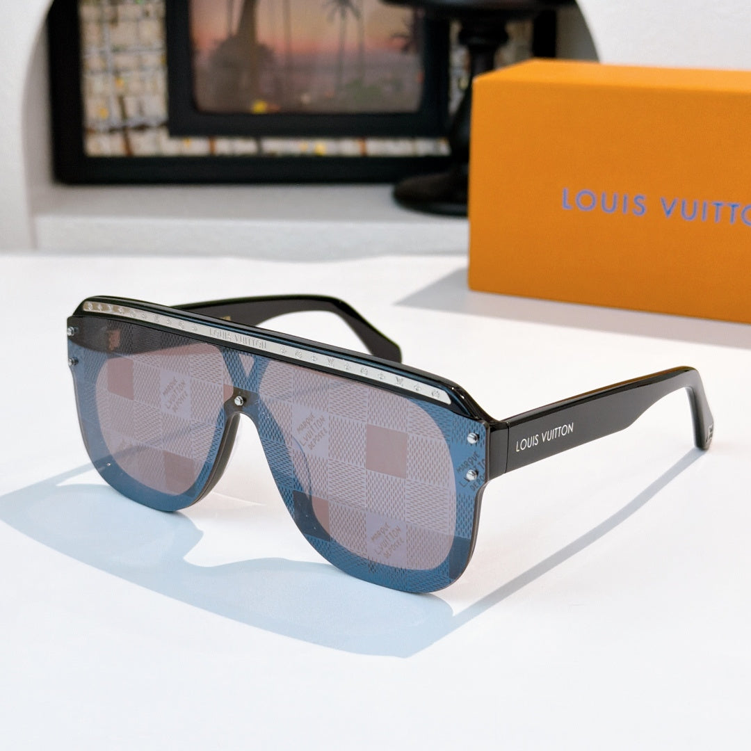 Sunglasses with light blue frames and reflective blue-tinted lenses, gold-tone trim.