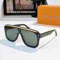 Sunglasses with dark green frames and dark tinted lenses, gold-tone trim and hinge details.
