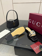 Gucci ladies black mule sandals with yellow insole and rhinestone GG emblem