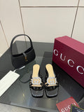 Gucci ladies black mule slide shoes with rhinestone GG emblem and block heel