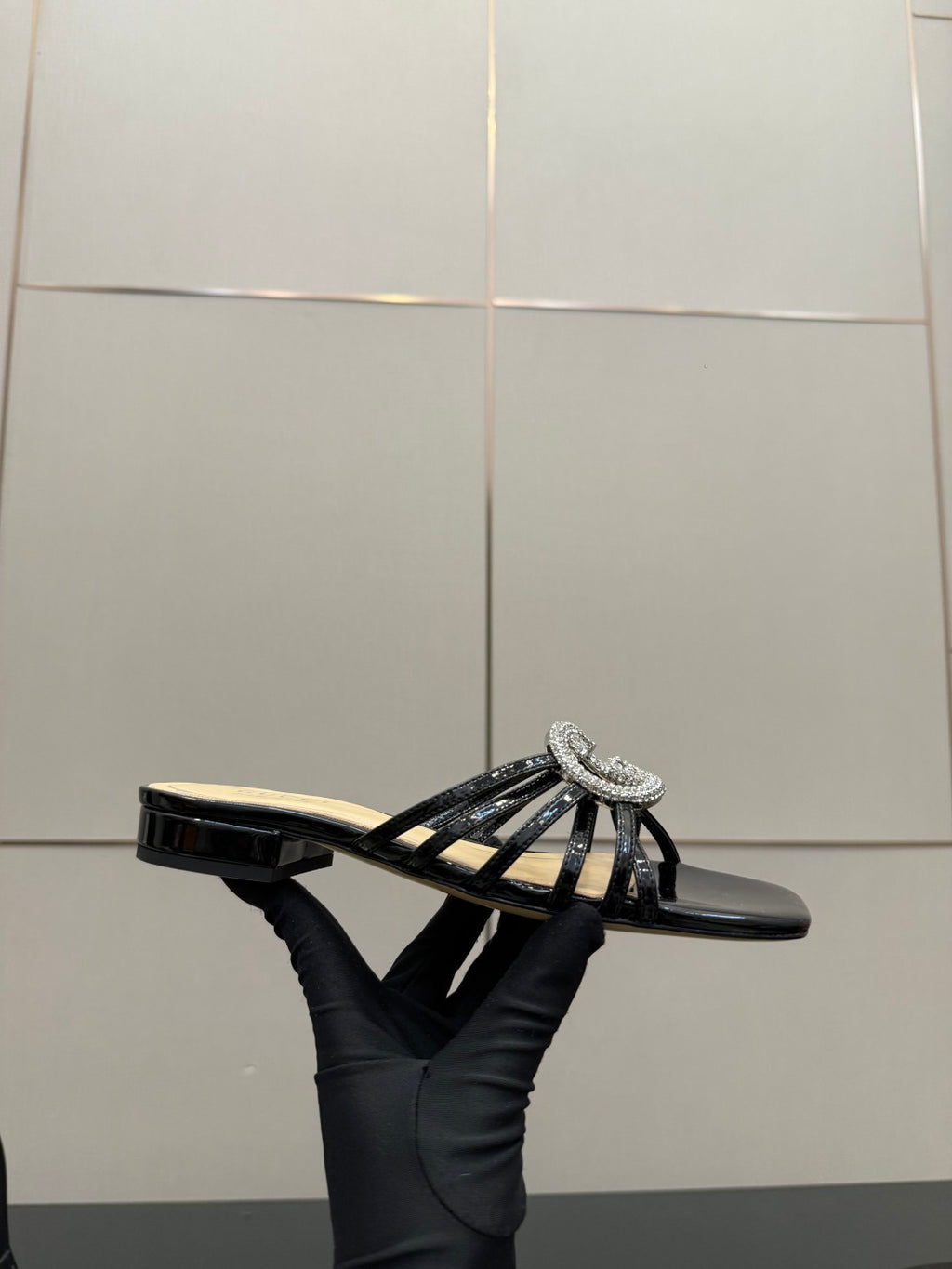 Gucci ladies black mule slide shoe with rhinestone GG emblem and striped strap detail