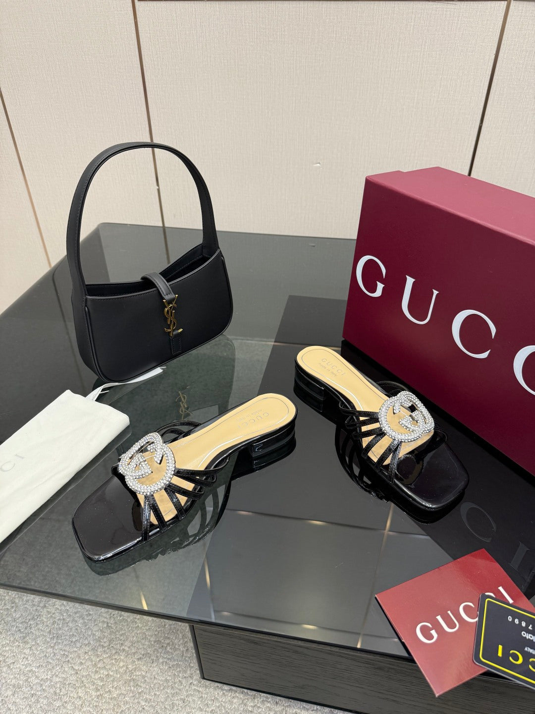 Gucci ladies black mule slide sandals with rhinestone GG emblem and open heel
