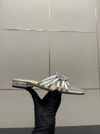 Gucci ladies silver jeweled slide sandals, side profile with low flat heel