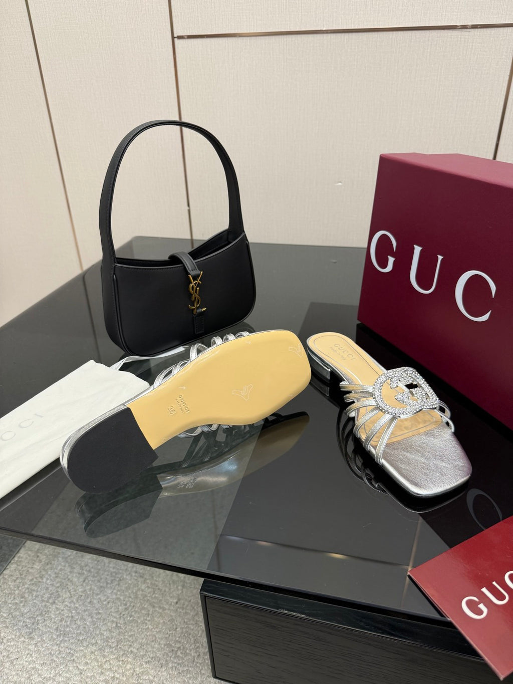 Gucci ladies silver jeweled slide sandals, side view with crystal bow and low sole
