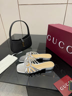 Gucci ladies silver jeweled slide sandals with crystal bow and mule-style straps