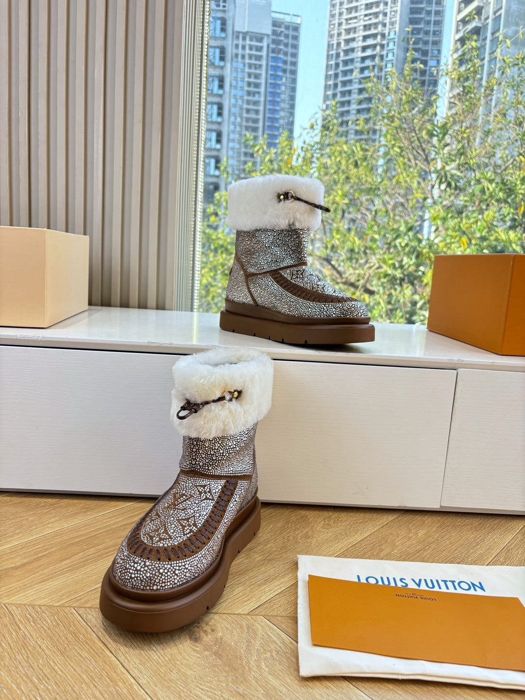Brown glitter winter boots with white shearling lining, cuff and sturdy rubber sole