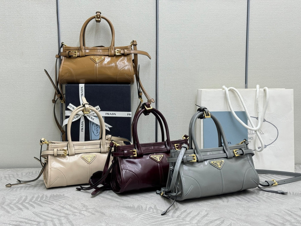 Prada handbags set with structured top handles and crossbody straps