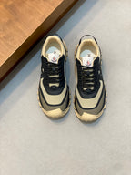 Moncler low-top sneakers in dark navy with beige trim and chunky rubber sole