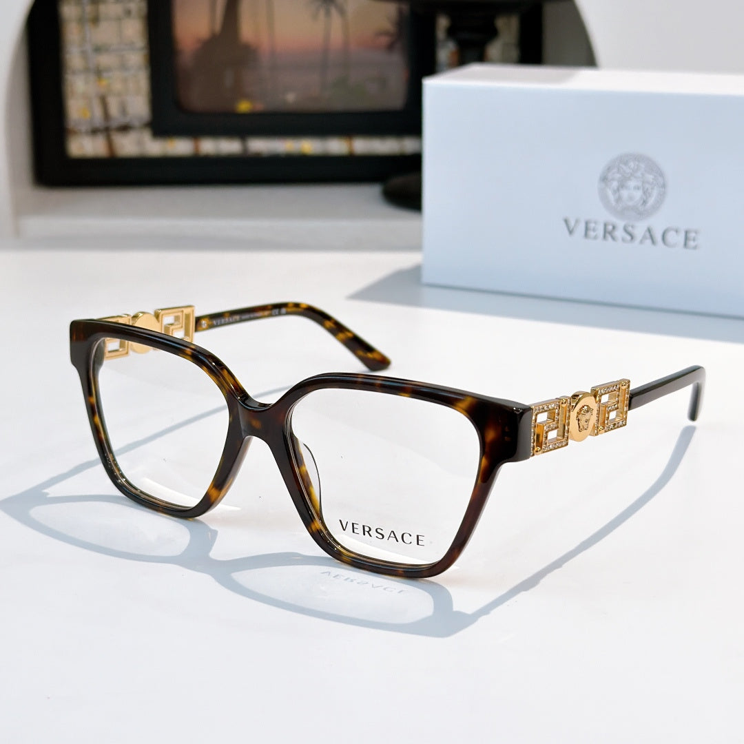 Tortoise square eyeglasses with gold temple logo detail and clear lenses