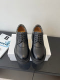 Dior unisex lace-up shoes in dark leather with patterned collar, front view
