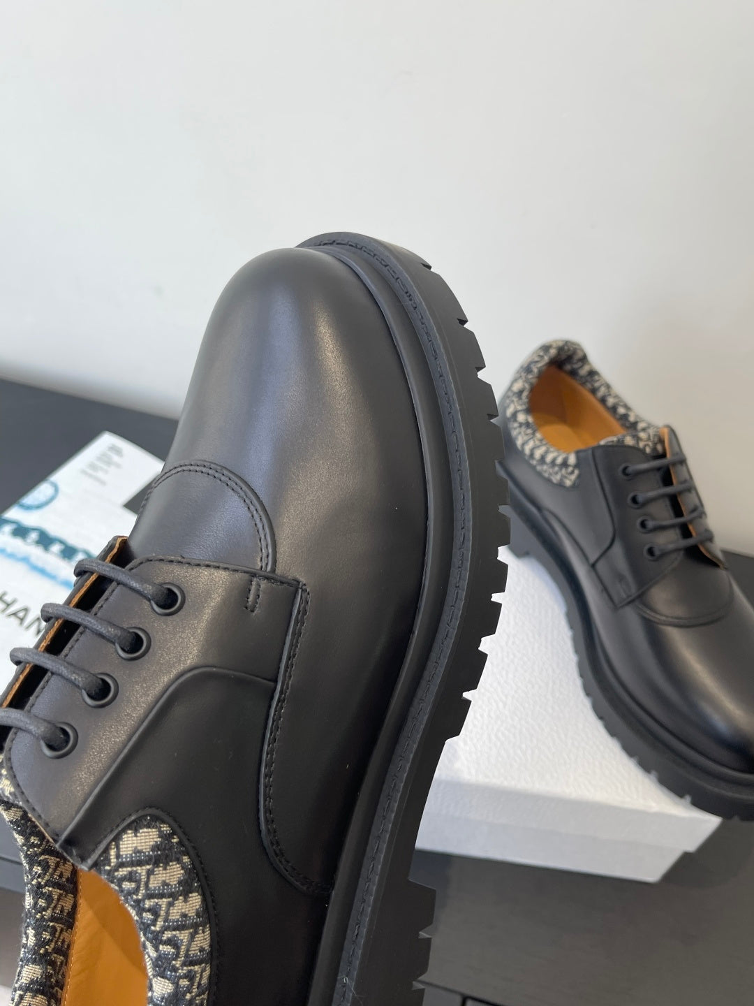 Dior lace-up shoes, dark leather side panel with patterned lining detail