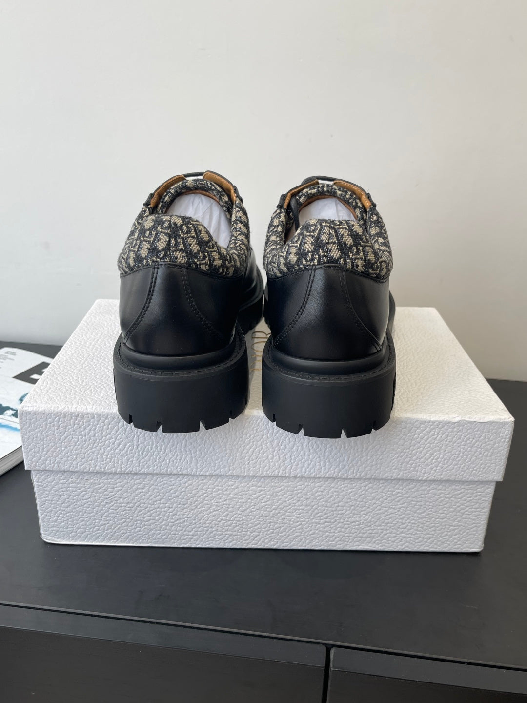 Dior unisex lace-up shoes, back view with patterned heel collar and chunky sole
