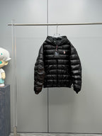 Long Moncler puffer jacket, black, zip-front with hood and small chest logo
