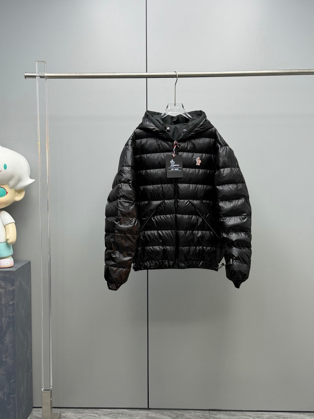 Long Moncler puffer jacket, black, zip-front with hood and small chest logo