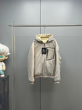 Light beige long zip-up puffer jacket with hood, ribbed cuffs, and front tags