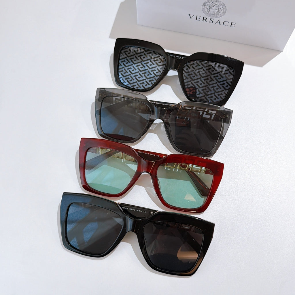 Three sunglasses in mixed frames—black and red—with patterned lenses and gold accents