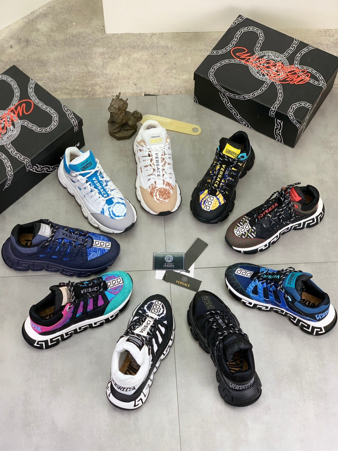 Assorted chunky sneakers set in white, blue, black, and multicolor with tread soles.