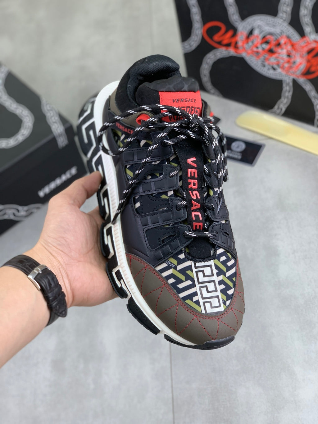 Versace lace-up sneaker in black with multicolor logo panel and red accents