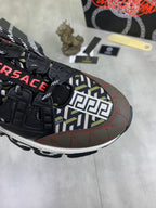 Versace sneaker upper in black with multicolor geometric panel and red stitching