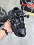 Versace luxury sneakers, black with blue mesh panels and black strap detailing