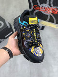 Versace sneakers, black with blue and yellow logo panels, chunky tread sole