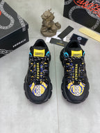Versace lace-up sneakers pair in black with blue and yellow graphic accents