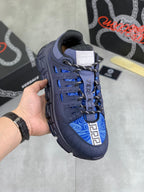 Versace luxury sneakers in dark navy with blue laces and contrast logo detail