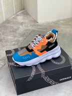 Versace chunky sneakers on box, blue orange and black with white platform sole