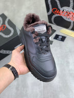 Versace lace-up sneakers in dark gray with faux-fur collar and chunky rubber sole