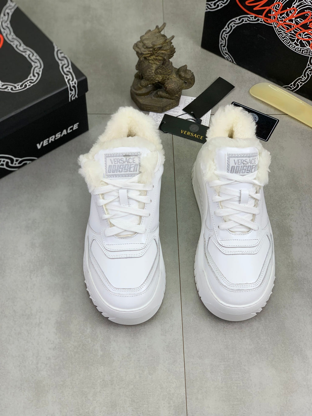 Pair of Versace white fuzzy-collared sneakers with white laces