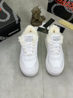 Pair of Versace white fuzzy-collared sneakers with white laces