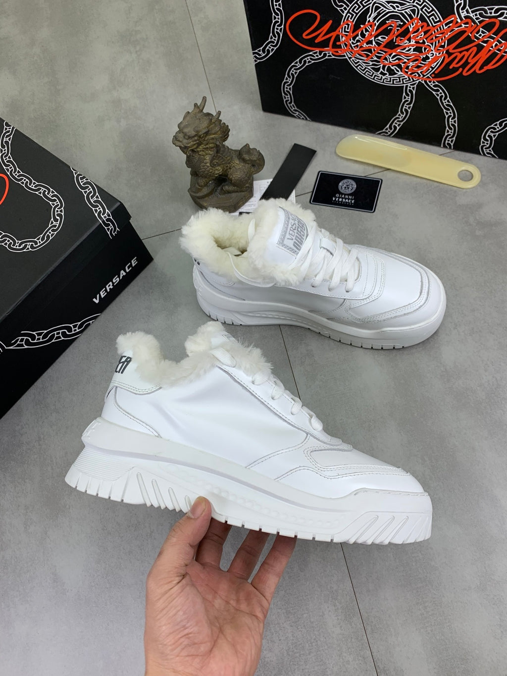 Versace white leather sneakers with fuzzy cuffs and chunky sole