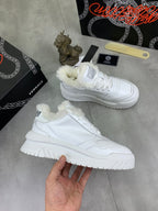 Versace white leather sneakers with fuzzy cuffs and chunky sole